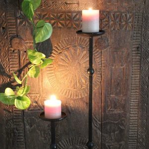 Candle stands with candles on them