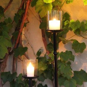Candle stands with candles on them