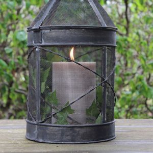 A lantern with a candle in it