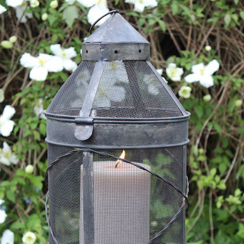 A lantern with a candle in it
