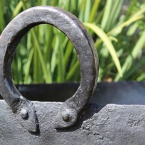 iron handle on a fire pit