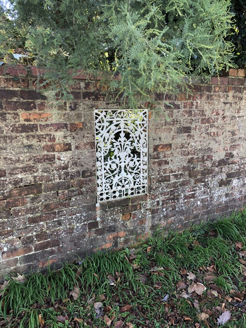 Brick wall with iron feature inset