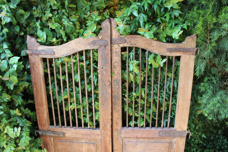 Timber gate with iron bars