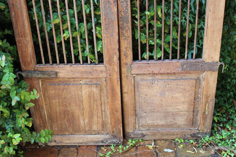 Timber gate with iron hinges