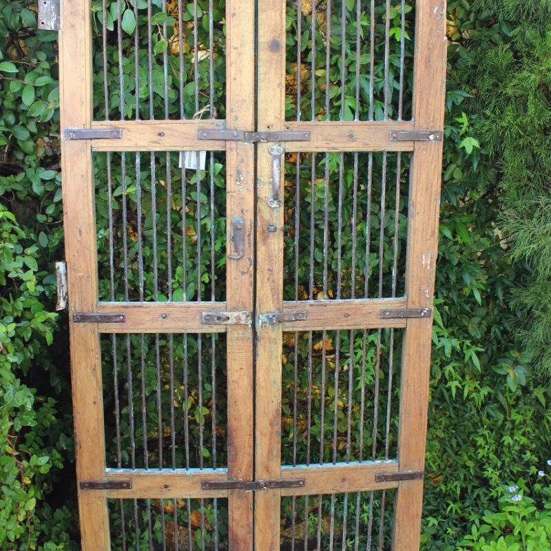 Timber frame gate with iron bars
