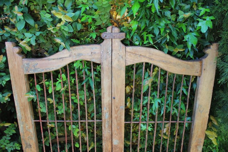 Timber gate with metal latch