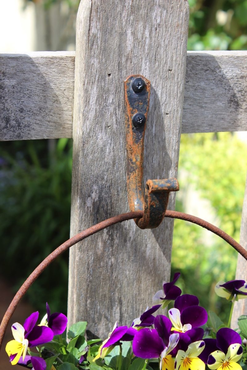 iron hook on a picket gate